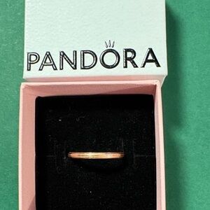 Pandora ribbed rose gold plated band.